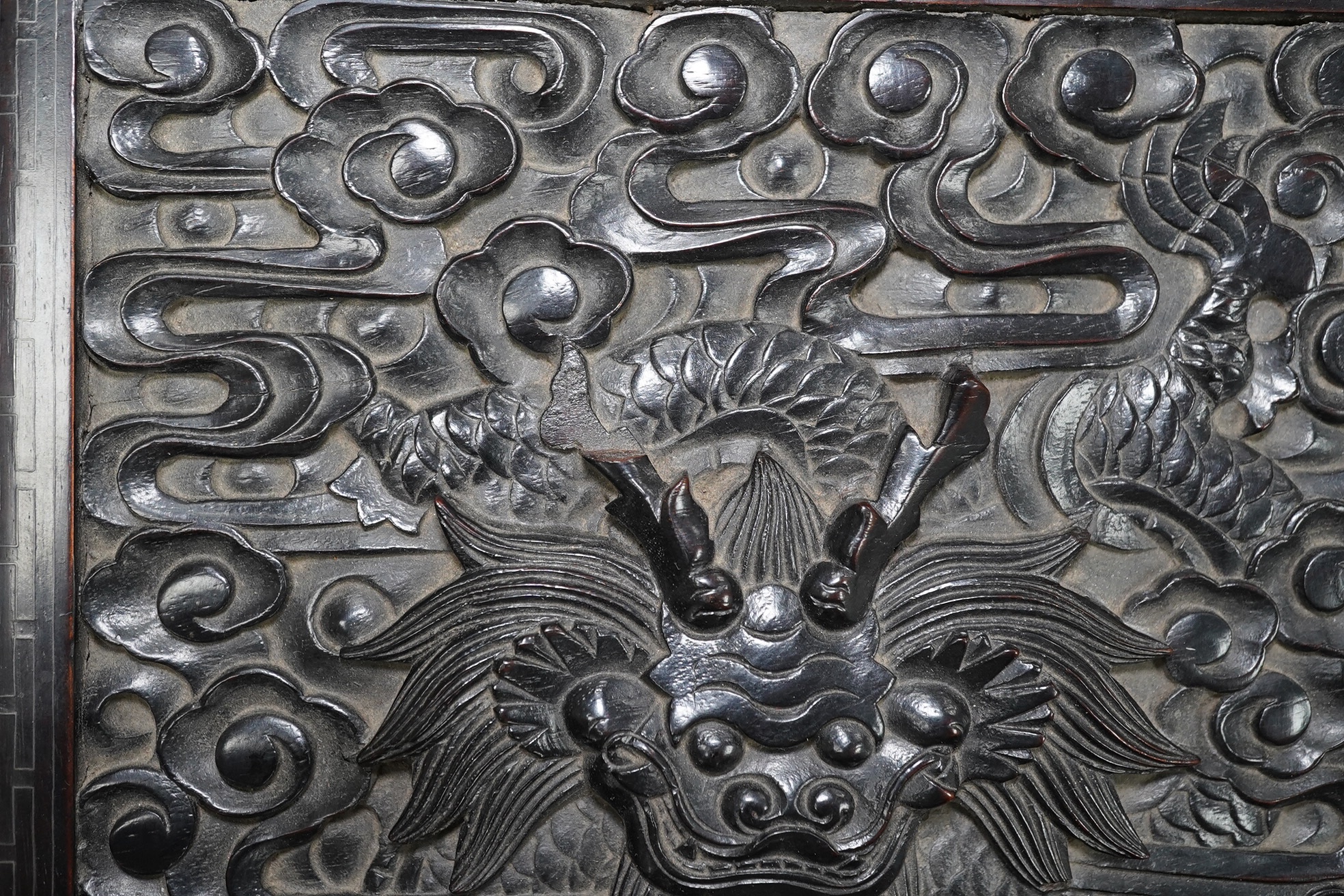 An important pair of Chinese carved zitan and silver wire inlaid ‘cloud and dragon’ curio cabinets and stands, duobaoge, probably Imperial, late Qing dynasty